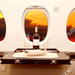 cropped-stock-photo-luxury-interior-in-bright-colors-of-genuine-leather-in-the-business-jet-sky-clouds-and-sunset-424966609.jpg